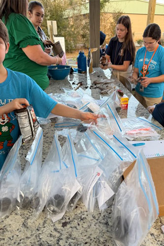 4-H making seed bombs