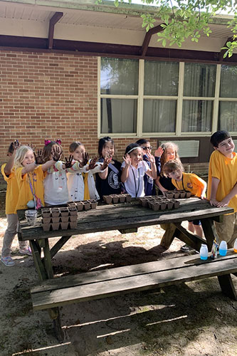 school kids in garden